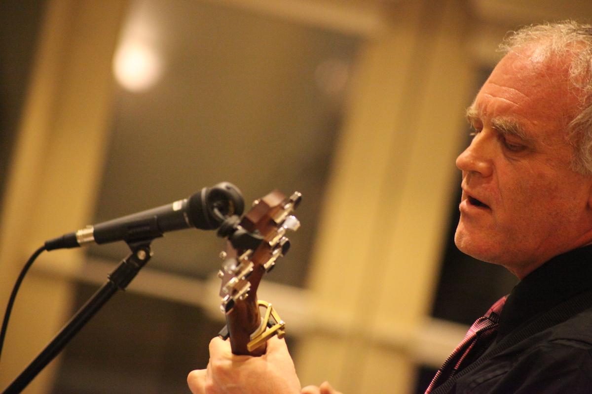 Steve Graham singing with guitar